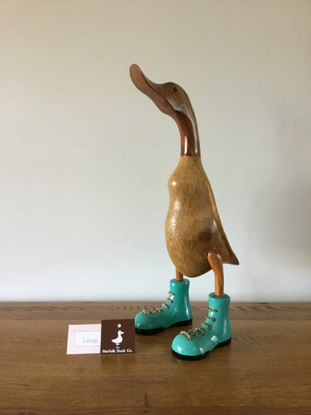 Large duck in Laced painted boots