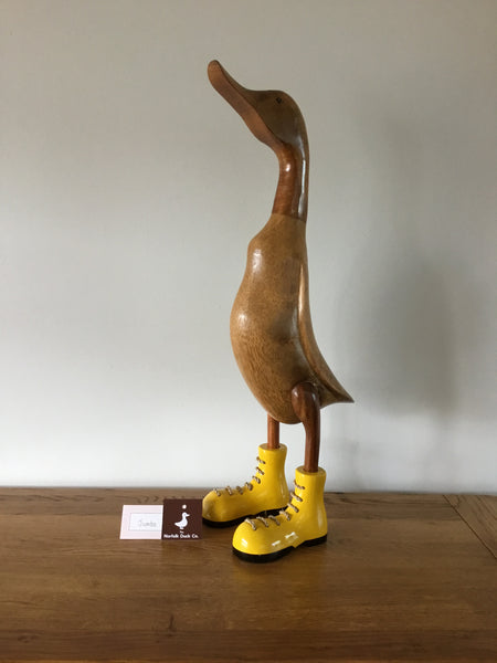 Large duck in Laced painted boots